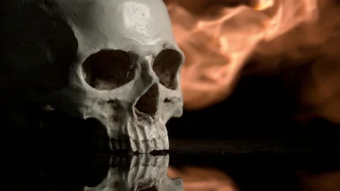 Nuclear war imagery - human skull burning slow motion Stock Footage 143352097