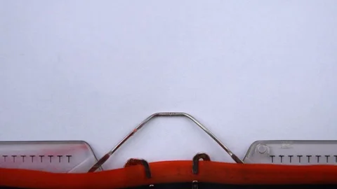 Nuclear war - phrase printed on an old typewriter in red letters, close up. Видео 126777660