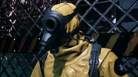 A nuclear war survivor scientist checks the radiation level with a radiation 스톡 동영상 144278558