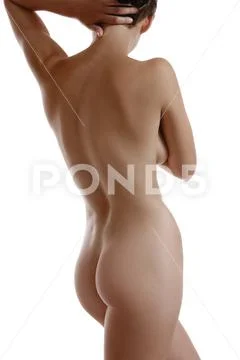 Nude woman covering her breast Stock Photo