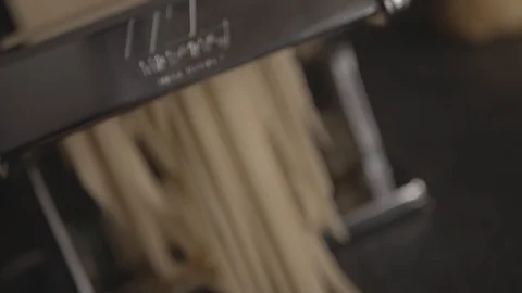 Nudelmaschine Produktion. Pasta making with pasta machine Stock Footage