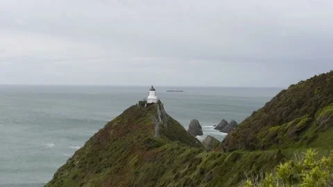Nugget Point lighthouse on the Catlins coast, Otago, New Zealand. Stock Footage 135939162