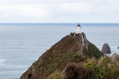 Nugget point Lighthouse Foto stock