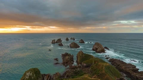 Nugget Point Sunrise, Time Lapse Pan Left Video stock 63889060
