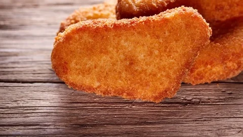 Nuggets on Wood Background Stock Footage 72671625