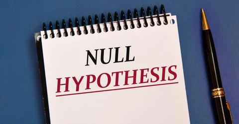 NULL HUPOTHESIS - words in a white notebook on a blue background with a pen Stock Photos