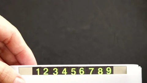 Number from 1 to 9,7 or 8 o'clock in card phone holder for wrong parking car Video stock 229369254