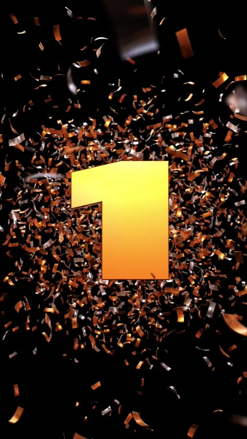 Number 1 which appears passing through a cloud of golden confetti on a blac.. Video stock 266785098