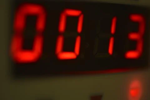 The number 13 on the electronic clock display Foto stock