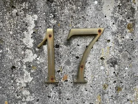 Number 17 on stone background Stock Photos