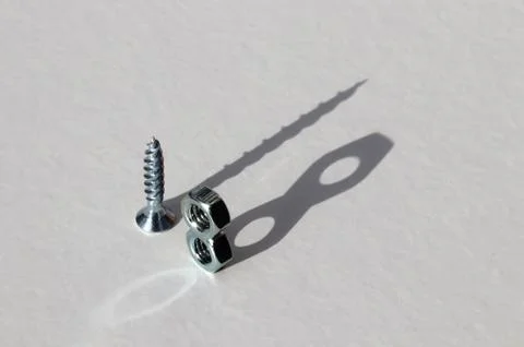 The number 18 displayed as a shadow using screw and hex nuts Stock Photos