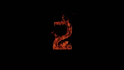 The number 2 burns with fire on a black background, the number is on fire, t Stock Footage 202021686