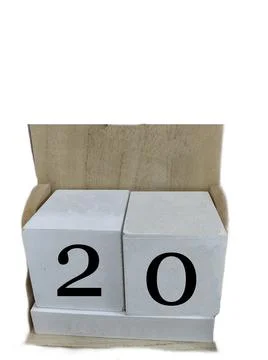 Number 20 on two cubes placed in a wooden support 写真素材
