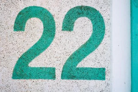 Number 22 texture painted on wall 스톡 사진