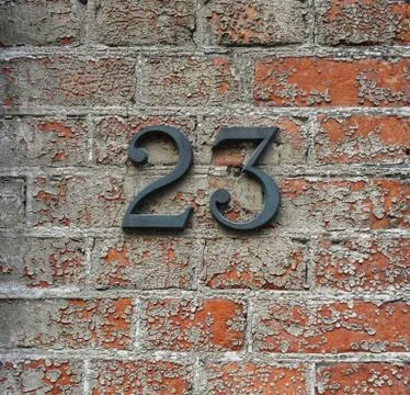 Number 23 on a wall Stock Photos