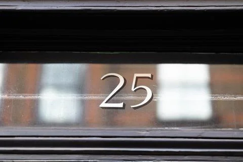 Number 25 on a window Stock Photos