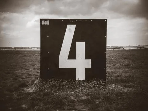 Number 4 countdown panel in Templehof Airport, Berlin, Germany Stock Photos