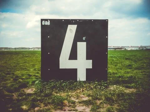 Number 4 countdown panel in Templehof Airport, Berlin, Germany Stock Photos