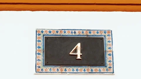 Number 4 (four) Affixed to a Building Stock Footage 265967064