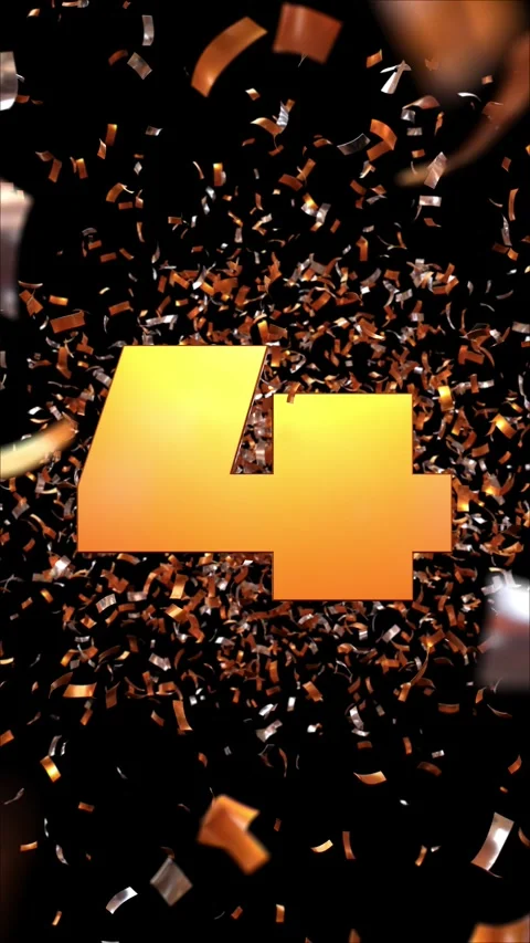 Number 4 which appears passing through a cloud of golden confetti on a blac.. Vidéo 266787079