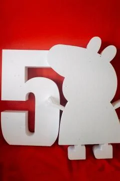 Number 5, letter E. text ONE and peppa pig figure. white foam products. decor Stock Photos