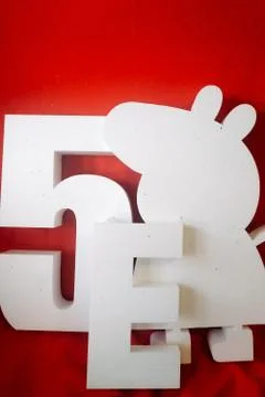 Number 5, letter E. text ONE and peppa pig figure. white foam products. decor Stock Photos