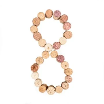 The number 8 is made from wine corks, close-up. Isolated on white background Stock Photos