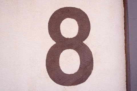 Number 8 texture painted on wall 스톡 사진