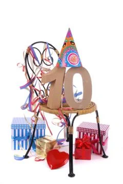 Number of age in a colorful studio setting with paper party hat and figures, 스톡 사진