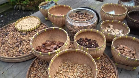 A number of baskets filled with different seeds and nuts in Bali, Indonesia. Stock Footage