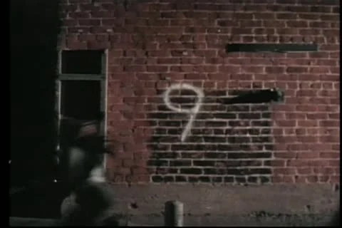 Number countdown from ten to one against brick wall Stock Footage 11357137