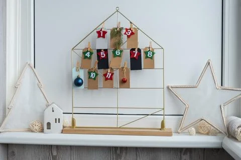 Number on craft paper notes with tasks before Christmas holidays. Female making Stock Photos