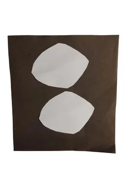 Number eight shape made of paper on a dark background Stock Photos