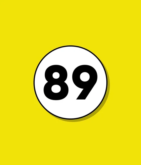 Number eighty-nine appears inside white circle on vibrant yellow background.. Stock Footage 332396603