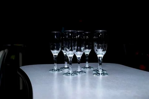 A number of empty glasses on the table in the cafe. Background. Pre-serving Stock Photos