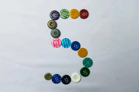 The number five is made up of buttons Stock Photos