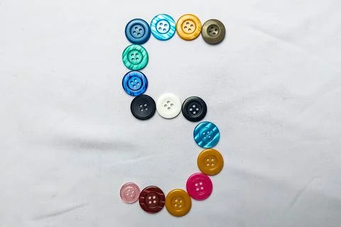The number five is made up of buttons Stock Photos