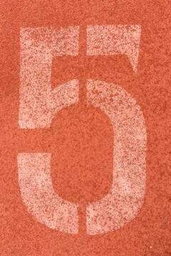 Number five on the start of a running track - check my portfolio for other nu Foto stock