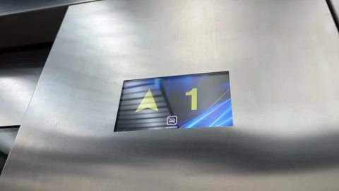 Number of floor on screen of elevator that go up from first to third  floor Stock Footage 258660134