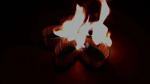 A number of matches ignited from one another Stock Footage 75425445