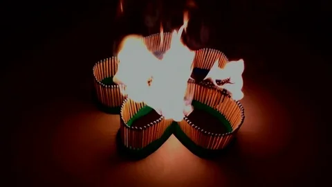 A number of matches ignited from one another Stock Footage 75467236