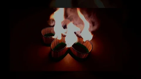 A number of matches ignited from one another Stock Footage 75467658