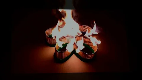 A number of matches ignited from one another Stock Footage 75547024