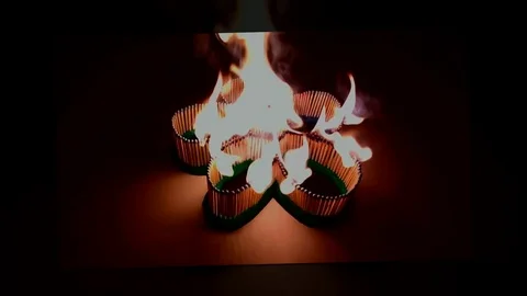 A number of matches ignited from one another Stock Footage 75549060
