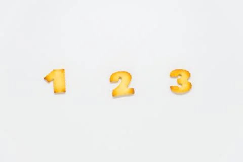 Number shape of cracker on white background Stock Photos