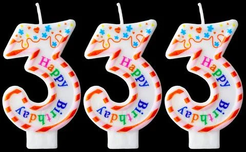 Number three hundred thirty-three shaped birthday candles with colorful spr.. Stock Photos