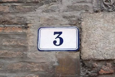 Number Three on Wall Stock Photos