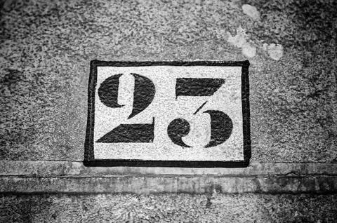 Number twenty three on a wall Stock Photos