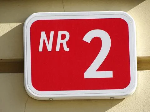 Number two on a plaque placed on a building 스톡 사진