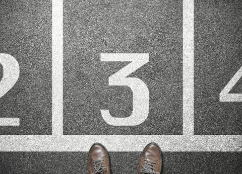 Number two three four on start line on road, start point, competition, race Stock Photos